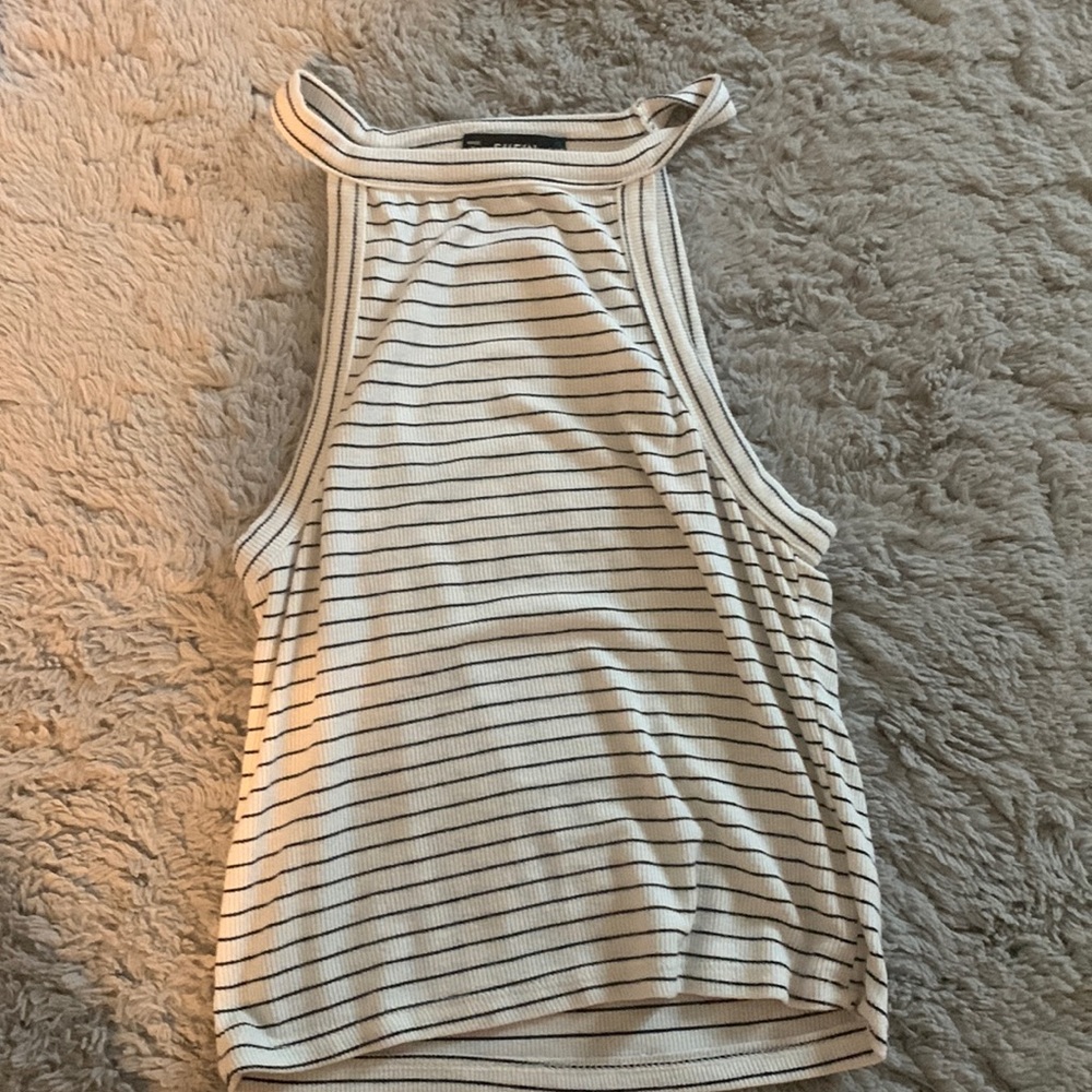 Striped tank top from Shein has a tight fit and is in good condition